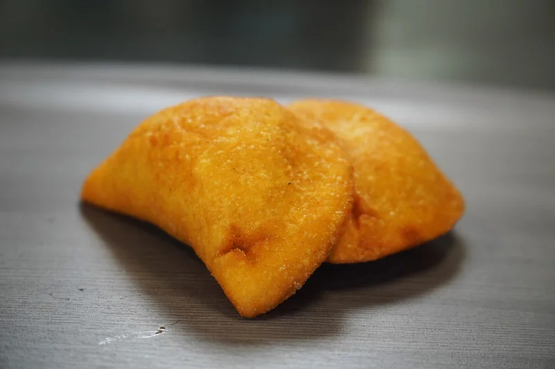 Golden fried empanadas served at TequeArepa